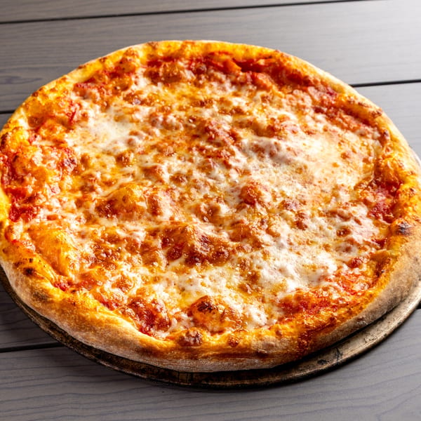 A whole cheese pizza from Annie's Pizza Subs & Wings, with melted mozzarella and tomato sauce.